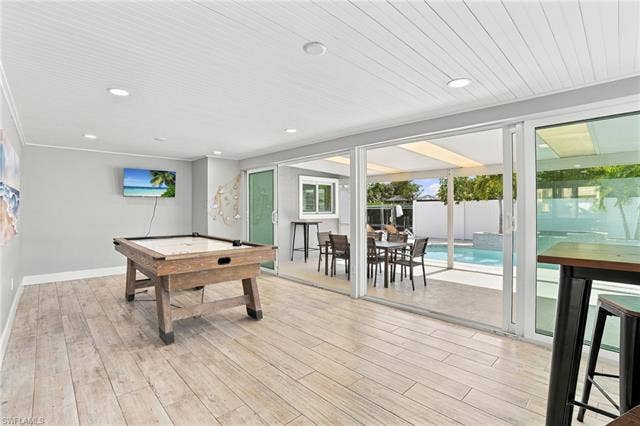 310 Madison Ct, Fort Myers Beach, FL 33931 Game room with plenty of space for entertaining