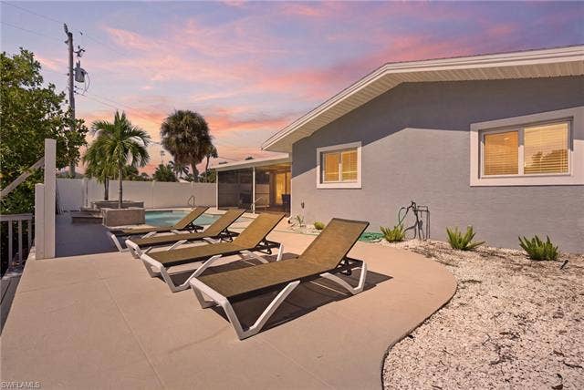 310 Madison Ct, Fort Myers Beach, FL 33931 Plenty of outdoor pool deck space for lounging in the Florida sun