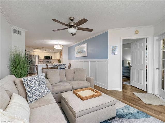8659 River Homes Ln, #1202, Bonita Springs, FL 34135 Kick back, relax, and feel right at home in this light-filled living space designed for easy Florida living