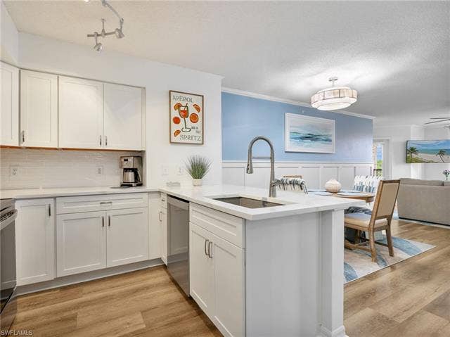 8659 River Homes Ln, #1202, Bonita Springs, FL 34135 White and bright open kitchen, Undermount sink, Bosch extra quiet dishwasher, LG appliances with an open concept and breakfast bar