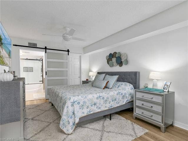 8659 River Homes Ln, #1202, Bonita Springs, FL 34135 Well appointed master with walk in closet and spa like bathroom