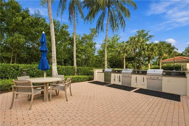 23750 Via Trevi Way, #1503, Estero, FL 34134 Grilling area by pool