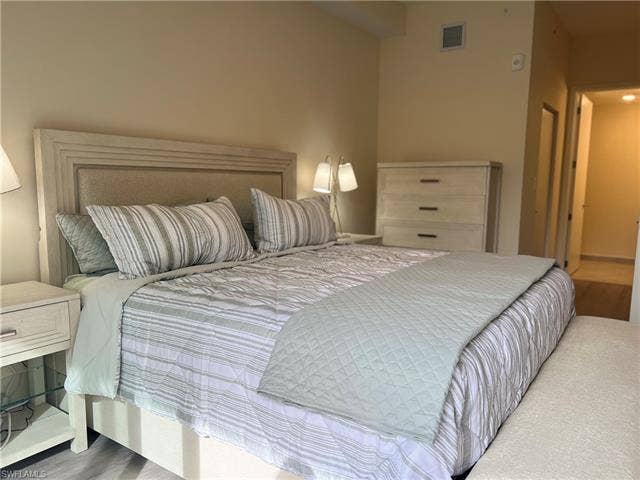26600 Rosewood Pointe Dr, #B-107, Bonita Springs, FL 34135 Bedroom with wood-type flooring