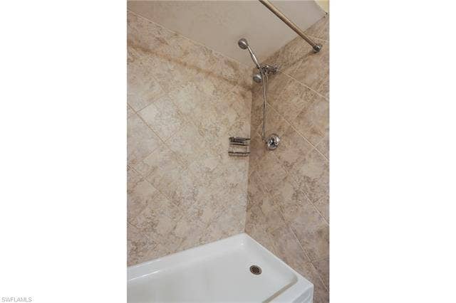25484 Cockleshell Dr, #901, Bonita Springs, FL 34135 Bathroom with tiled shower