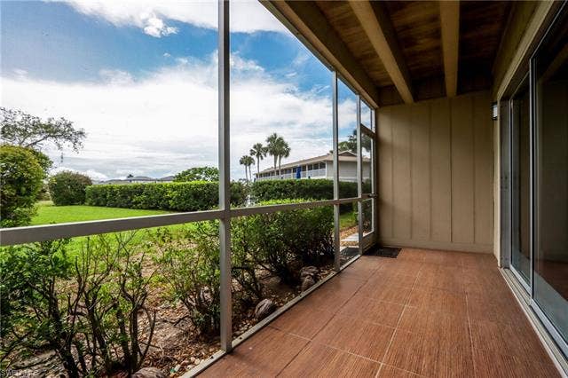25484 Cockleshell Dr, #901, Bonita Springs, FL 34135 View of unfurnished sunroom