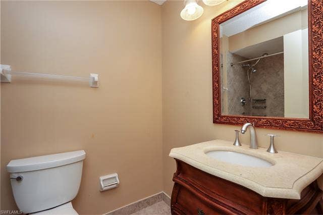 25484 Cockleshell Dr, #901, Bonita Springs, FL 34135 Bathroom with vanity and a shower