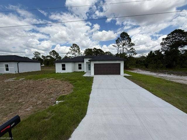 765 S Puccini Ave, Lehigh Acres, FL 33974 765 S Puccini Ave, Lehigh Acres, FL 33974
