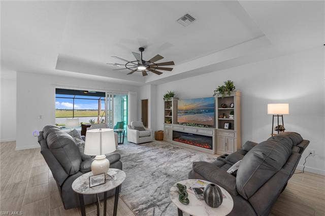 44810 Marina Ln, Punta Gorda, FL 33982 Tray ceiling with a ceiling fan