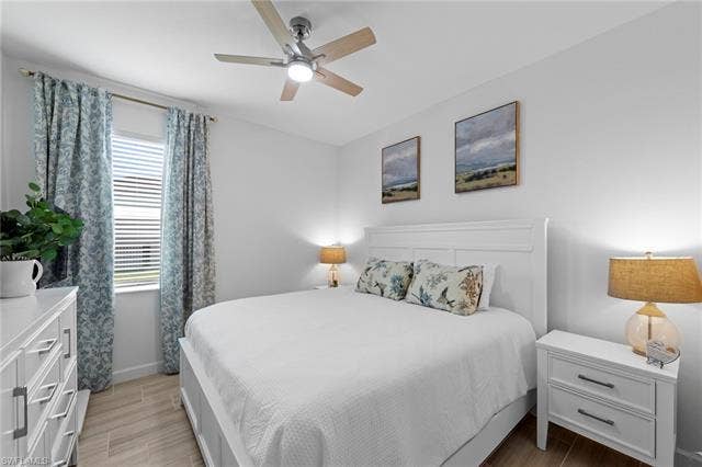 44810 Marina Ln, Punta Gorda, FL 33982 Recessed lighting, wood-finish flooring, and a ceiling fan with integrated lighting