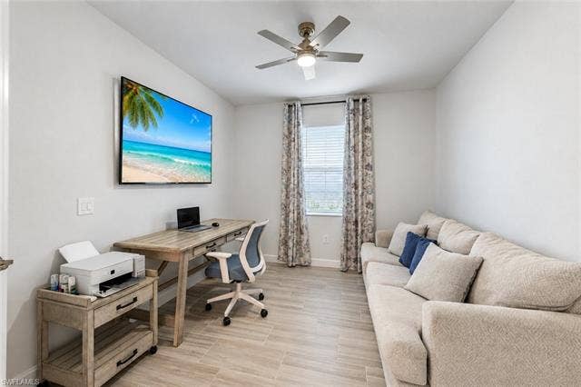 44810 Marina Ln, Punta Gorda, FL 33982 Recessed lighting, ceiling fan with light fixture, wood-finish flooring, and window with blinds