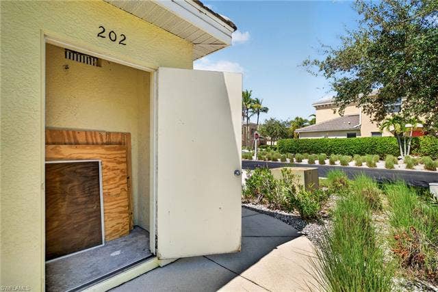 14543 Abaco Lakes Dr, #202, Fort Myers, FL 33908 Private exterior storage closet, offering convenient extra space for beach gear, bicycles, and outdoor equipment.