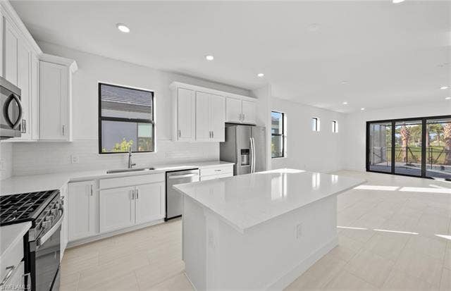 2151 Freemont Way, Naples, FL 34120 Photos are of similar Contour home. Homes may vary.