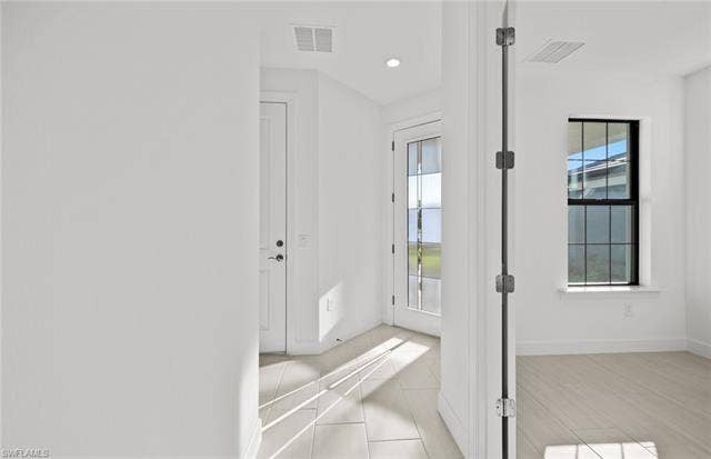 2151 Freemont Way, Naples, FL 34120 Photos are of similar Contour home. Homes may vary.