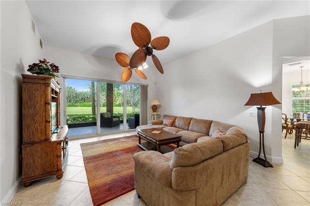 3142 Aviamar Cir, #2104, Naples, FL 34114 Tiled flooring, vaulted ceilings, and a ceiling fan