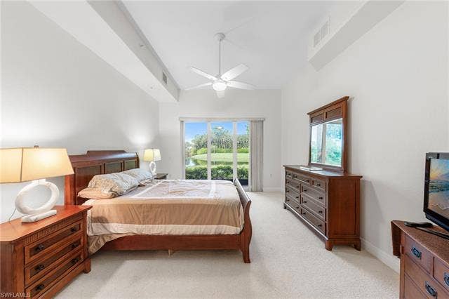 3142 Aviamar Cir, #2104, Naples, FL 34114 White carpeting complemented by white walls and a vaulted ceiling
