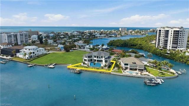 280 Estrellita Dr, Fort Myers Beach, FL 33931 Bird's eye view of a large body of water - Virtually Edited Image