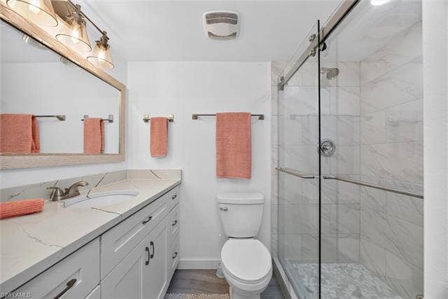6220 Augusta Dr, #117, Fort Myers, FL 33907 White shaker-style vanity with a light-toned countertop, rectangular undermount sink, and brushed nickel faucet