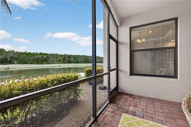 17950 Bonita National Blvd, #1513, Bonita Springs, FL 34135 Rear Eastern Exposure Screened-In Lanai with Lake, Golf Course, and Preserve Views