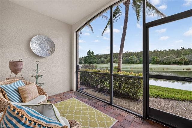 17950 Bonita National Blvd, #1513, Bonita Springs, FL 34135 Rear Eastern Exposure Screened-In Lanai with Lake, Golf Course, and Preserve Views
