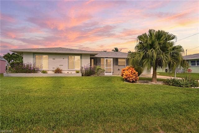 2816 18th Ave, Cape Coral, FL 33904 Front of home- virtually enhanced