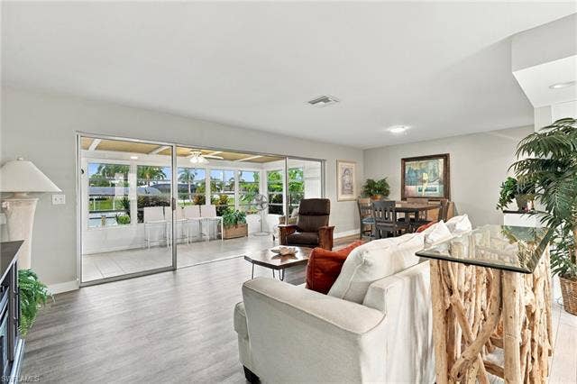 2816 18th Ave, Cape Coral, FL 33904 Spacious interior with wood-finish flooring and light-toned walls