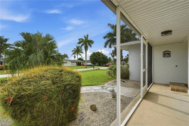 2816 18th Ave, Cape Coral, FL 33904 Front porch with screened in lanai