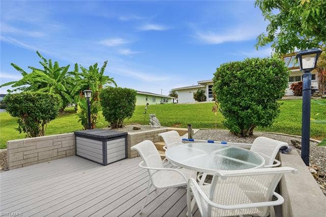 2816 18th Ave, Cape Coral, FL 33904 Outdoor deck with seating area right off your gulf access canal