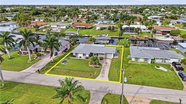 2816 18th Ave, Cape Coral, FL 33904 Aerial view of home on gulf access canal