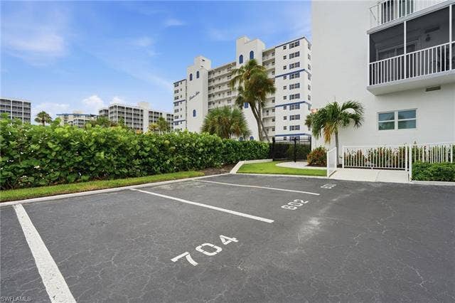 7000 Estero Blvd, #704, Fort Myers Beach, FL 33931 Your unit parking space is just steps from the lobby entrance . - Virtually Edited Image