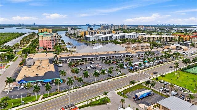 7000 Estero Blvd, #704, Fort Myers Beach, FL 33931 Santini Marina Plaza directly across the street. Dining, shopping, coffee.