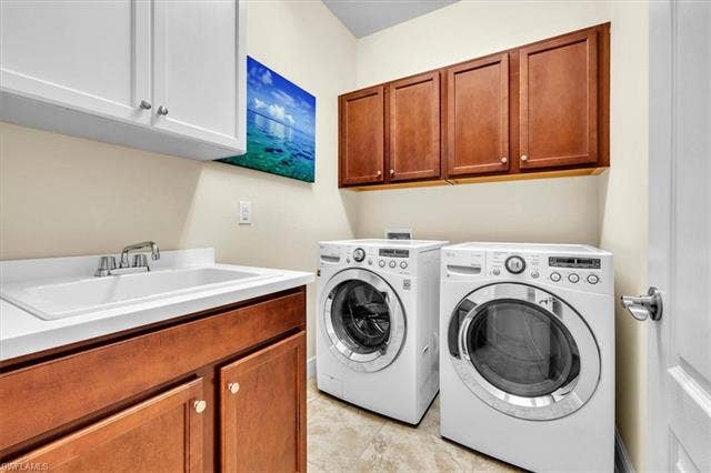 13491 Palmetto Grove Dr, Fort Myers, FL 33905 Laundry room in hallway to 2nd and 3rd bedrooms and bath.