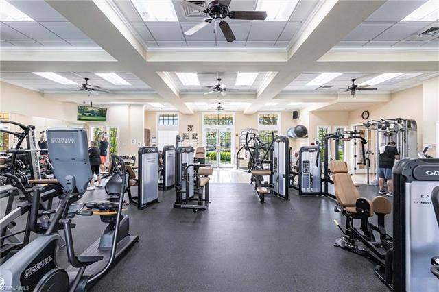 13491 Palmetto Grove Dr, Fort Myers, FL 33905 Attended fitness center overlooking the community pool.