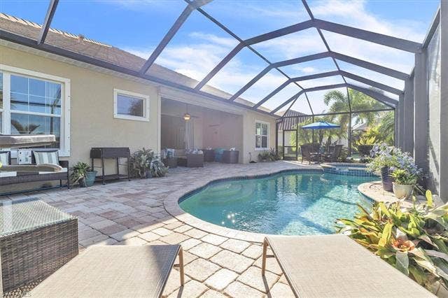 13491 Palmetto Grove Dr, Fort Myers, FL 33905 Screened lanai and pool deck with plenty of room to entertain.