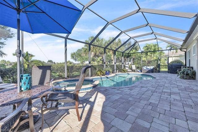 13491 Palmetto Grove Dr, Fort Myers, FL 33905 Extended pool deck.