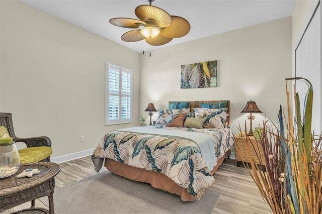 13491 Palmetto Grove Dr, Fort Myers, FL 33905 2nd bedroom off side hallway. Hardwood tile flooring.