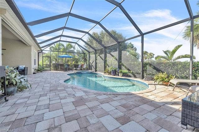 13491 Palmetto Grove Dr, Fort Myers, FL 33905 Extended pool deck.