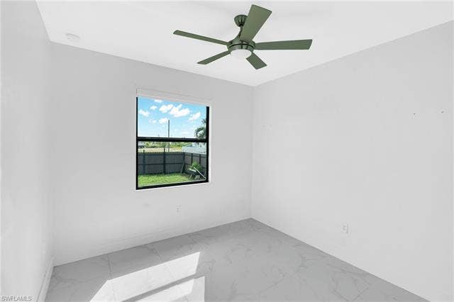 113 38 Pl, Cape Coral, FL 33993 Recessed lighting, ceiling fan with integrated light, tile flooring, and a window with exterior views