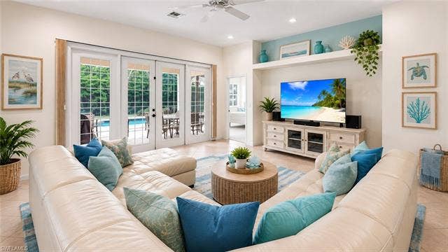 9375 Oak Strand Dr, Estero, FL 34135 Virtually stage living/family room