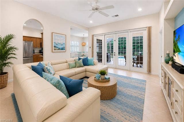9375 Oak Strand Dr, Estero, FL 34135 Virtually staged living/family room