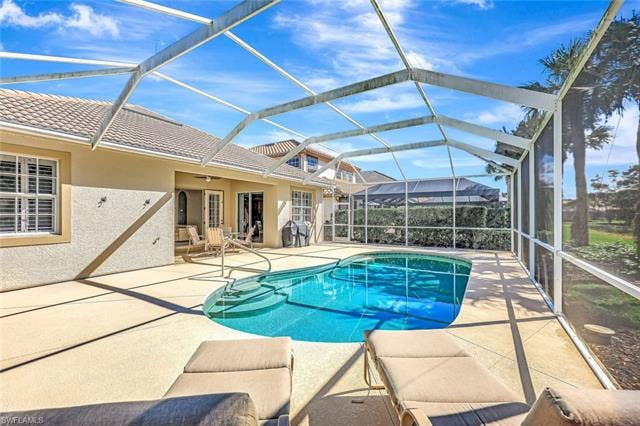 9375 Oak Strand Dr, Estero, FL 34135 Pool with a lanai and a patio