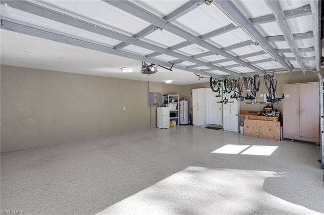 25295 Catskill Dr, Bonita Springs, FL 34135 2.5 Car Garage new epoxy flooring.