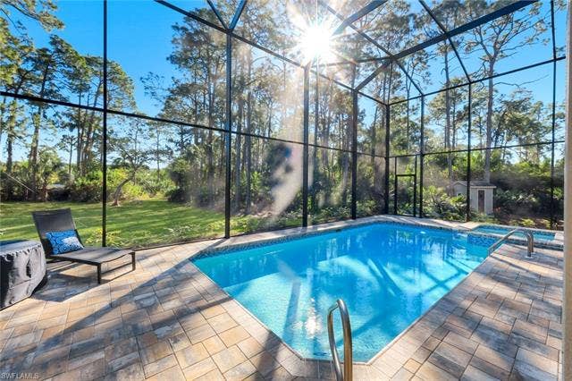 25295 Catskill Dr, Bonita Springs, FL 34135 New Two Story Pool Enclosure and Brick Pavers