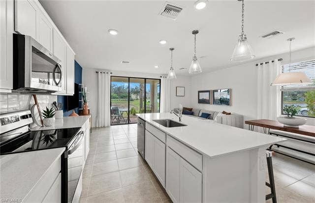 1558 Lake Jessup Cir, Cape Coral, FL 33909 Rowan staged Model.