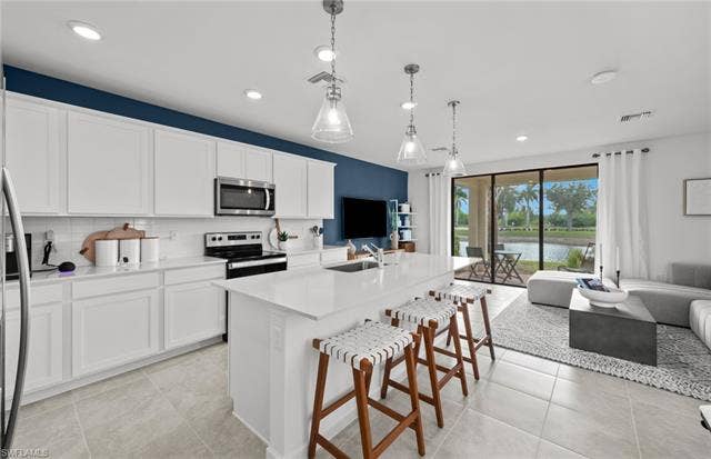 1558 Lake Jessup Cir, Cape Coral, FL 33909 Rowan staged Model.