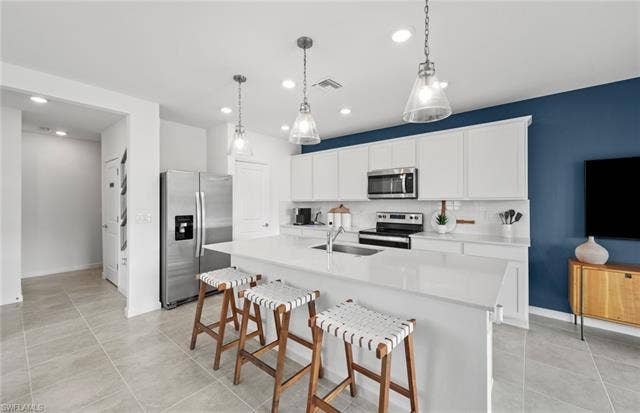 1558 Lake Jessup Cir, Cape Coral, FL 33909 Rowan staged Model.