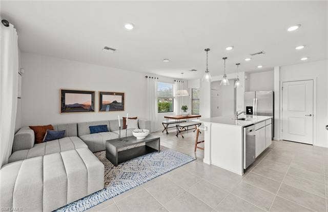 1558 Lake Jessup Cir, Cape Coral, FL 33909 Rowan staged Model.