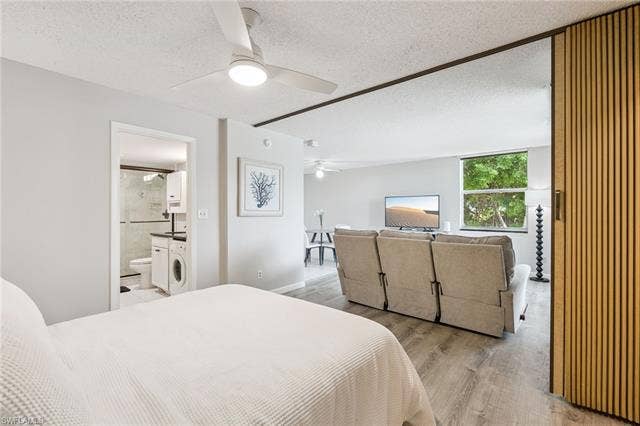 5500 Bonita Beach Rd, #308, Bonita Springs, FL 34134 Recessed lighting, wood-finish flooring, full-size window, and a built-in washer