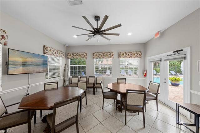 26485 Lucky Stone Rd, #202, Bonita Springs, FL 34135 Tiled flooring, multiple windows with blinds, recessed lighting, and a ceiling fan