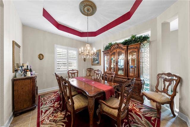 26485 Lucky Stone Rd, #202, Bonita Springs, FL 34135 Tray ceiling with decorative medallion and chandelier