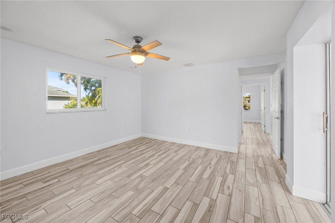 2514 SE 26th Avenue, Cape Coral, FL 33904 Empty room featuring wood finish floors and a ceiling fan
